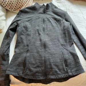 Lululemon full zip jacket. No hood. Slightly worn.